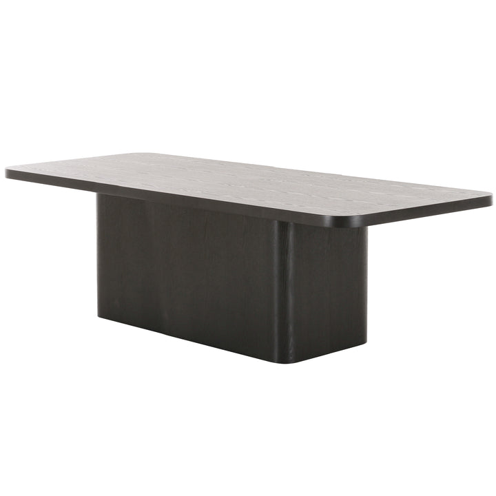 Black Colonna dining table, 2.4 meters long, showcasing a sleek, modern design with a smooth surface and sturdy legs.