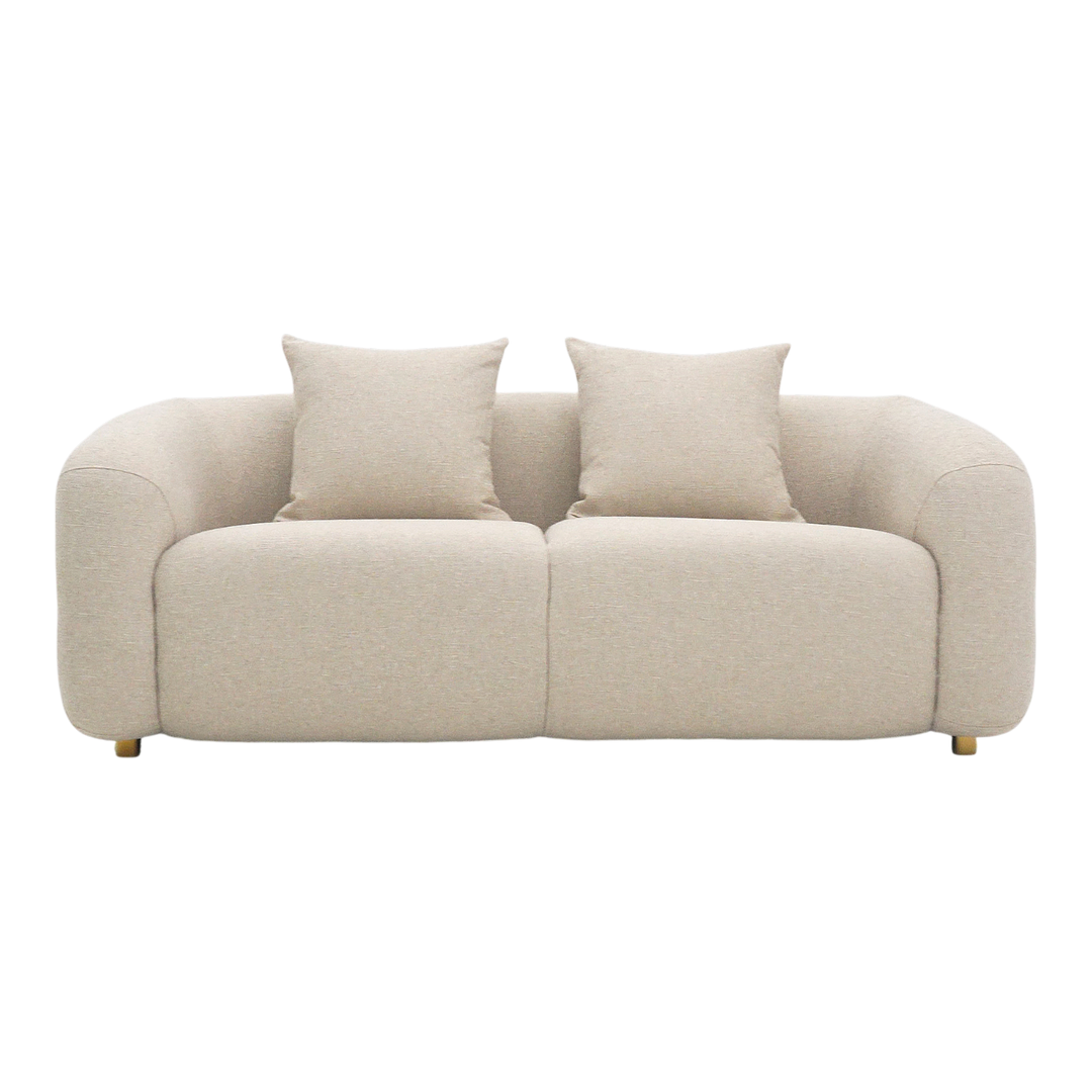 Petra 2 Seater Sofa in neutral fabric with plush cushions and wooden legs, ideal for modern living room seating.