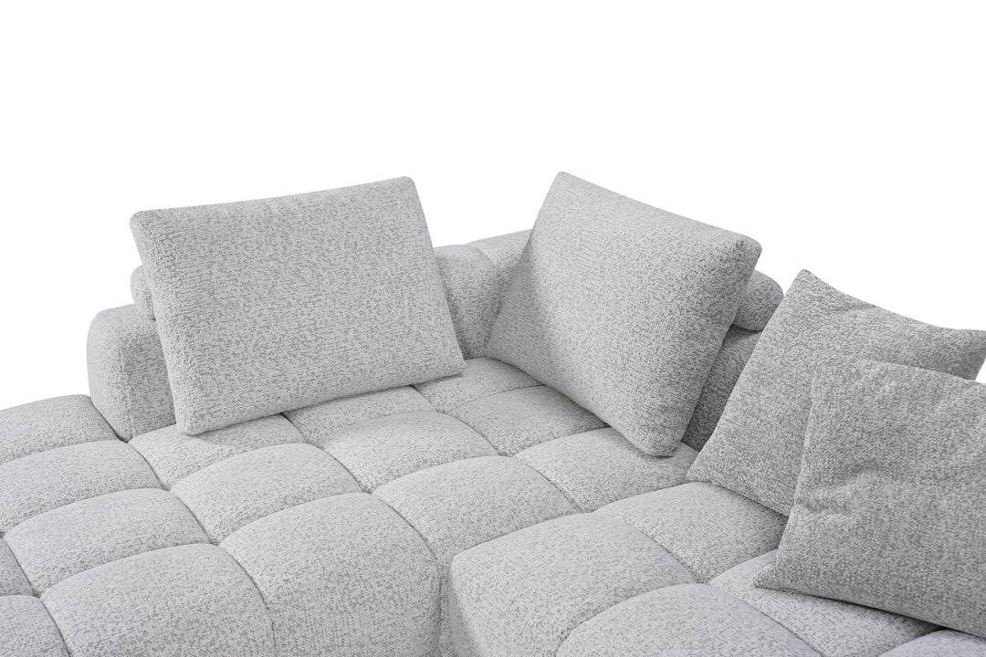 Cuddly modular sofa LHF in neutral fabric with plush cushions, designed for comfortable seating and versatile arrangement.