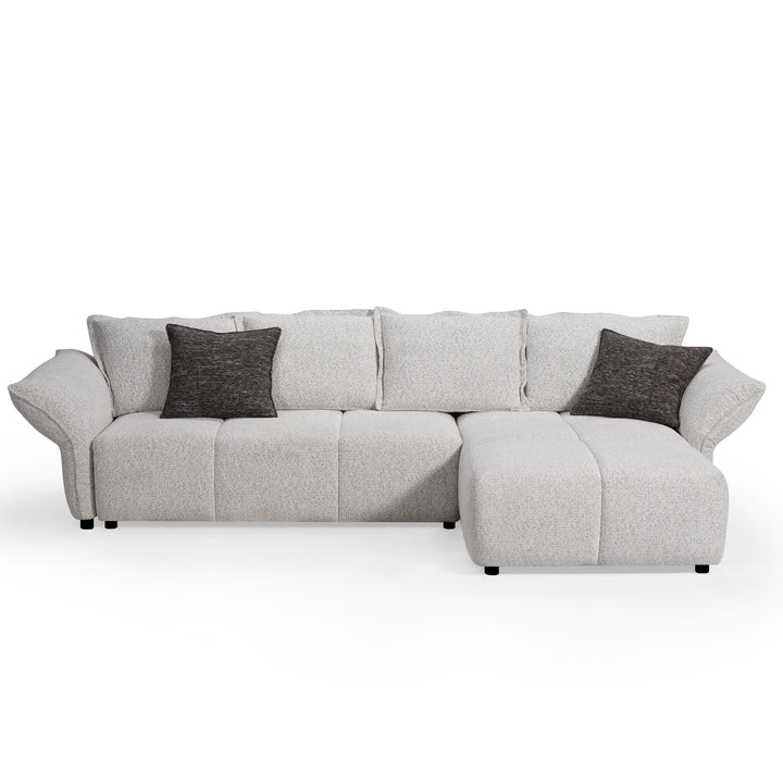 Comfortable Serenity sofa with plush cushions and modern design, perfect for living room relaxation.