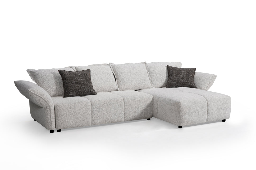 Comfortable beige Serenity Sofa with plush cushions and sleek design, perfect for modern living rooms.