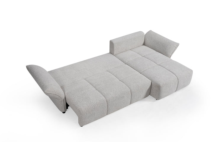 Comfortable beige Serenity sofa with plush cushions and modern design, perfect for living room seating.