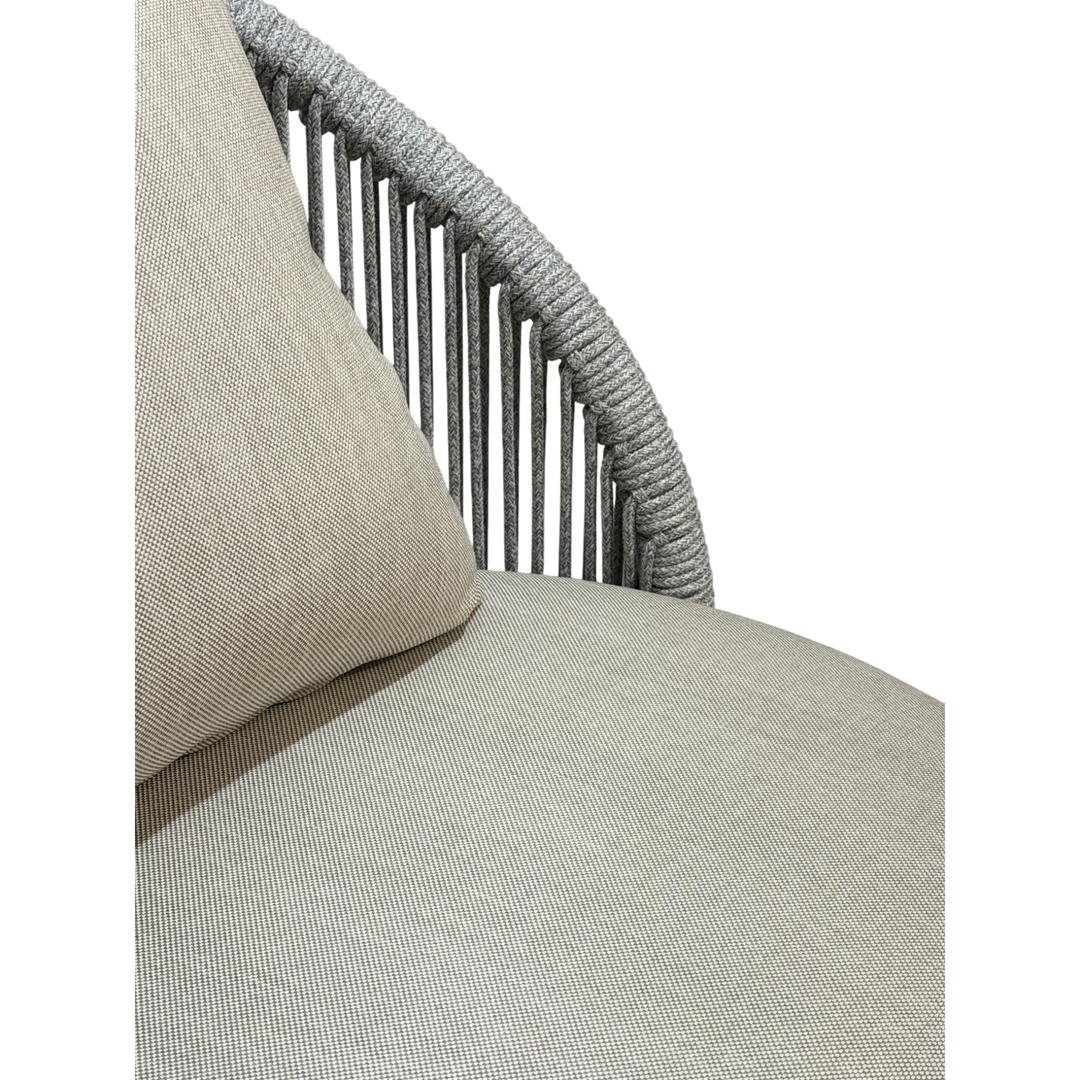 Grey Jardin outdoor arm chair with cushioned seat and armrests, designed for comfortable outdoor seating.