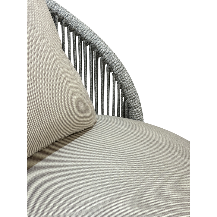 Grey Jardin outdoor arm chair with cushioned seat and armrests, designed for comfortable outdoor seating.