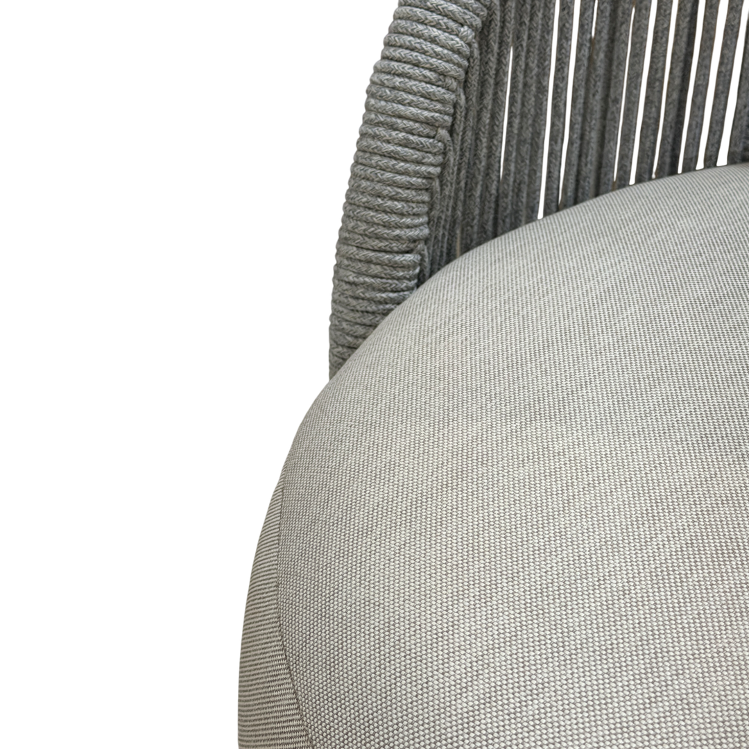 Grey Jardin outdoor arm chair with cushioned seat and armrests, designed for outdoor relaxation and casual seating.