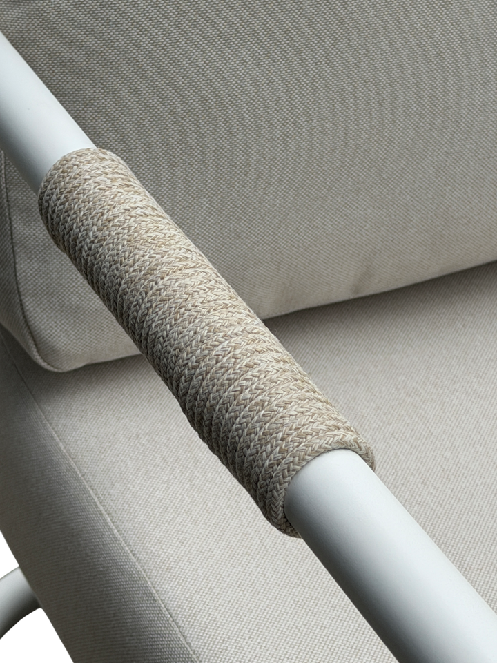 Cream Fiore dining chair with sleek, modern design, featuring a cushioned seat and stylish wooden legs.