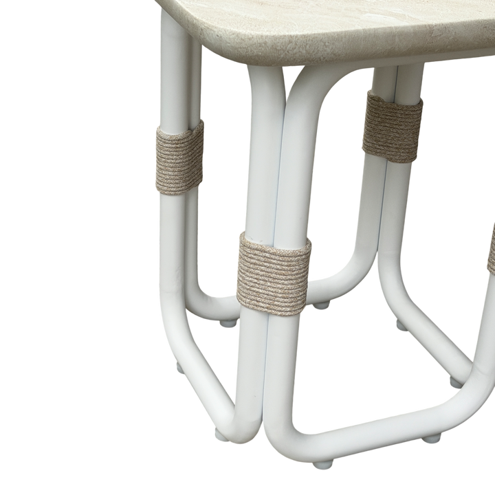 Cream-colored Fiore side table with a sleek, modern design and smooth surface, perfect for living room or bedroom decor.