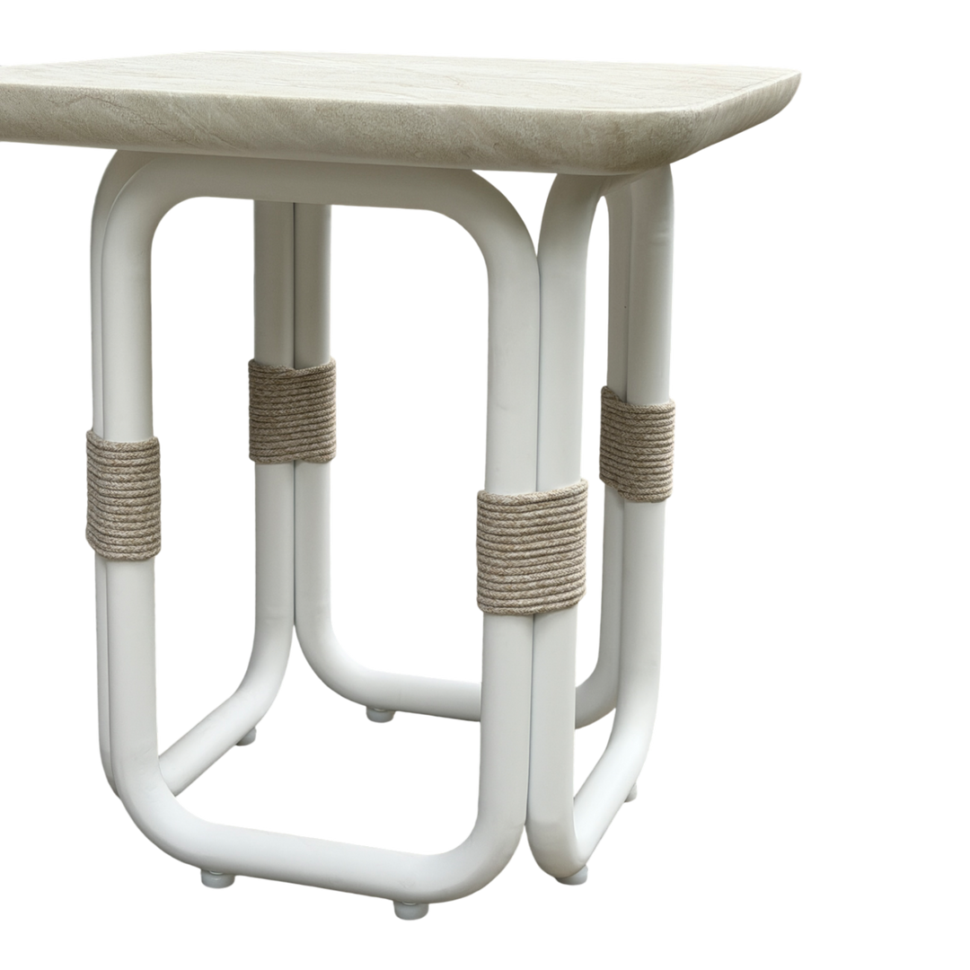 Cream Fiore side table with a sleek, modern design, featuring a round top and slender legs for contemporary home decor.