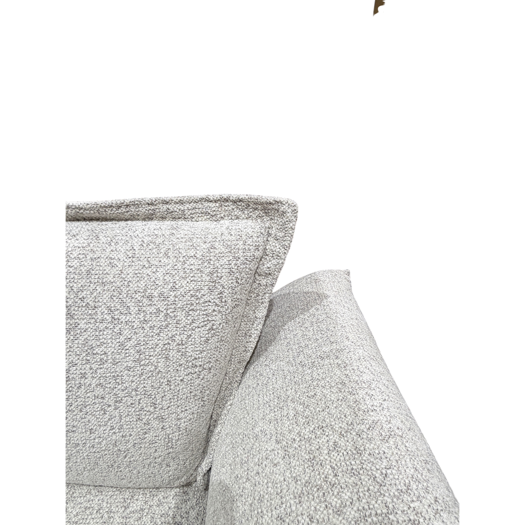 Comfortable Serenity sofa with plush cushions and modern design, perfect for living room relaxation and style.