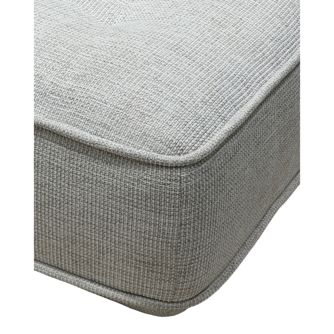 Cozy modular sofa with plush cushions and fabric upholstery, perfect for modern living rooms.
