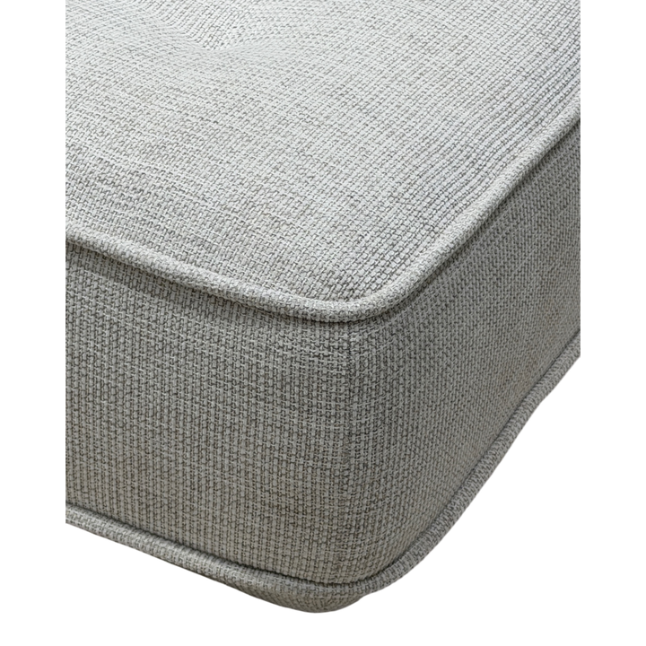 Cozy modular sofa with plush cushions and fabric upholstery, perfect for modern living rooms.