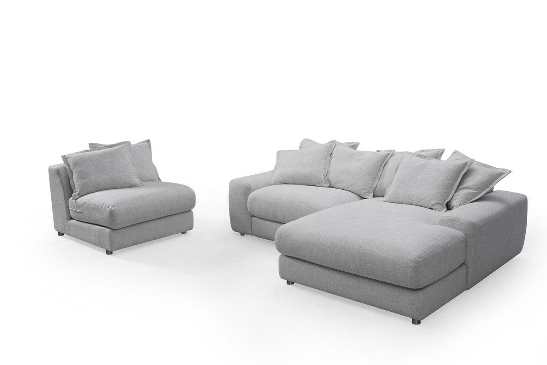 Corner sofa in a neutral fabric with plush cushions, featuring a right-hand facing design for a stylish and comfortable living room.