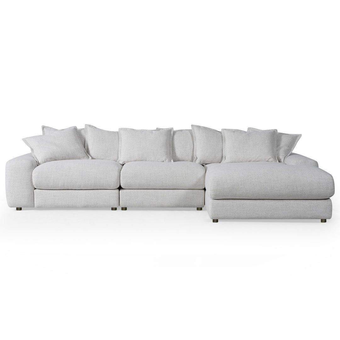 Corner sofa in neutral fabric, featuring plush cushions and a right-hand facing design, ideal for modern living rooms.