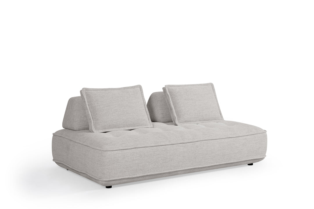Cozy modular sofa with plush cushions and fabric upholstery, ideal for modern living room seating.