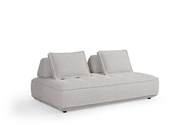 Cozy modular sofa with plush cushions and fabric upholstery, ideal for modern living room seating.