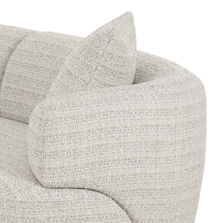 Modern Palermo sofa with plush cushions and sleek design, featuring neutral upholstery and stylish armrests.