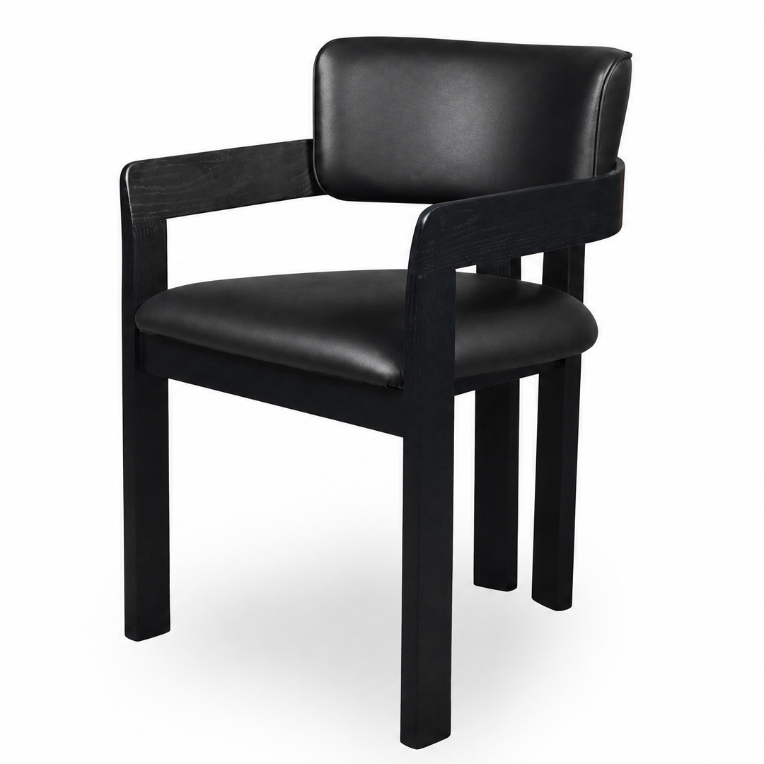 Black leather Maison dining chair with sleek modern design, featuring a comfortable padded seat and stylish metal legs.