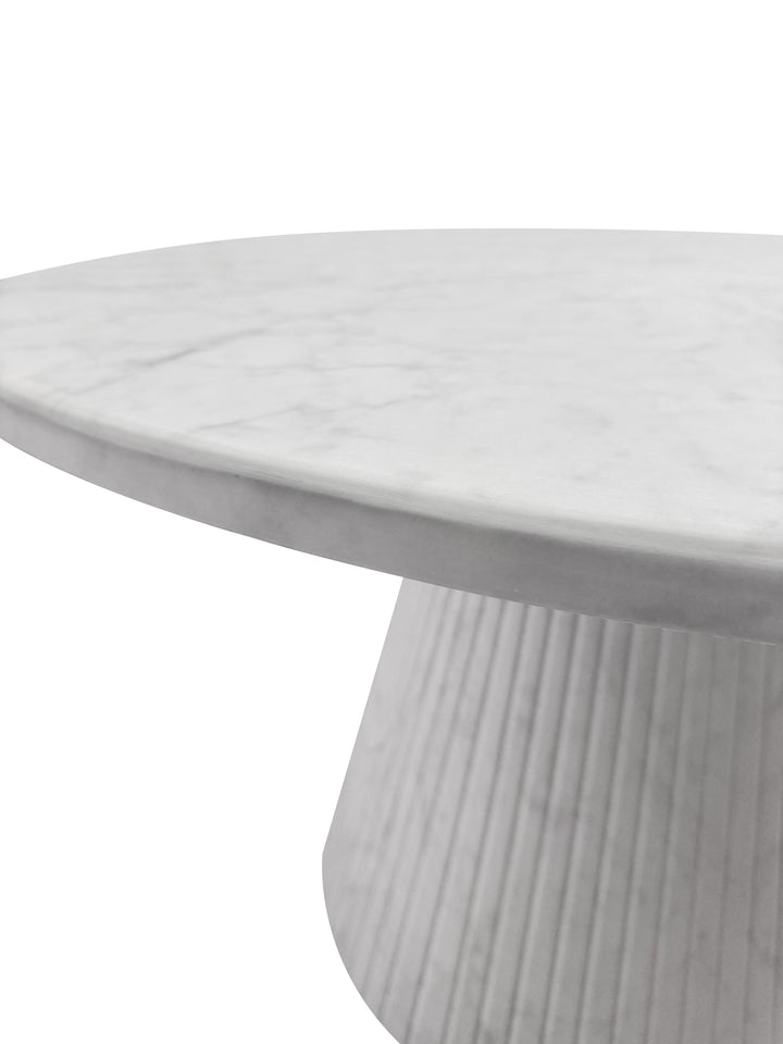 Round Verona dining table with a 1.2m diameter, featuring a sleek wooden surface and sturdy base for modern dining rooms.