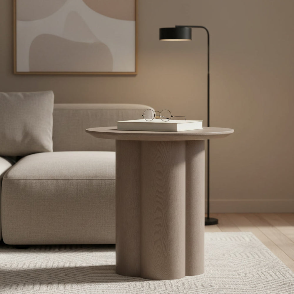 Contemporary Quattro Side Table in a living room setting, featuring a sleek design with a smooth surface and modern style.