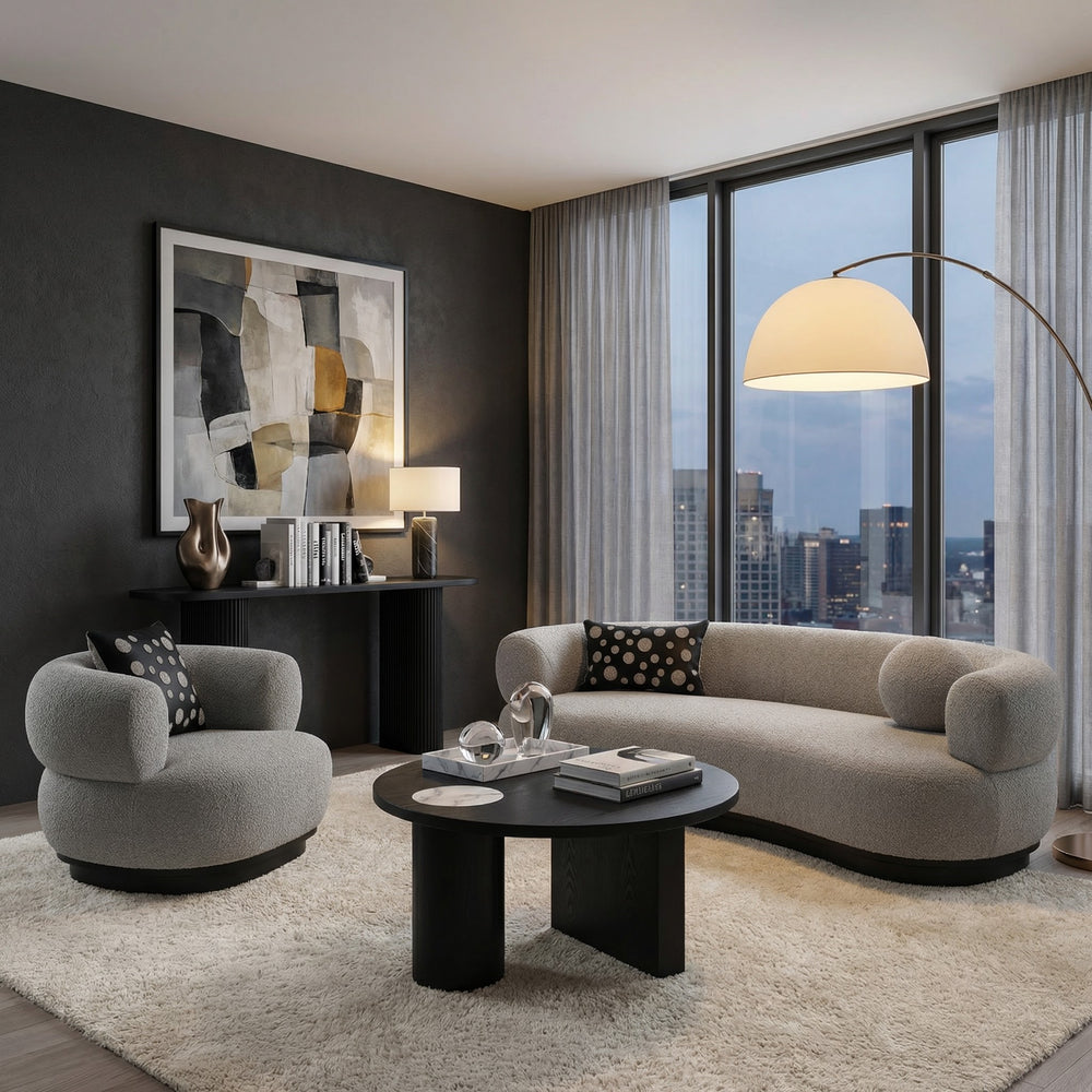 Grey Neptune Boucle Sofa in a modern living room with artwork and decor, showcasing contemporary style and plush fabric.