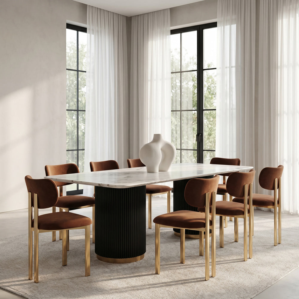 Mariella 2.4m luxury dining table with matching chairs, showcasing a sleek, modern design in a stylish dining room setting.
