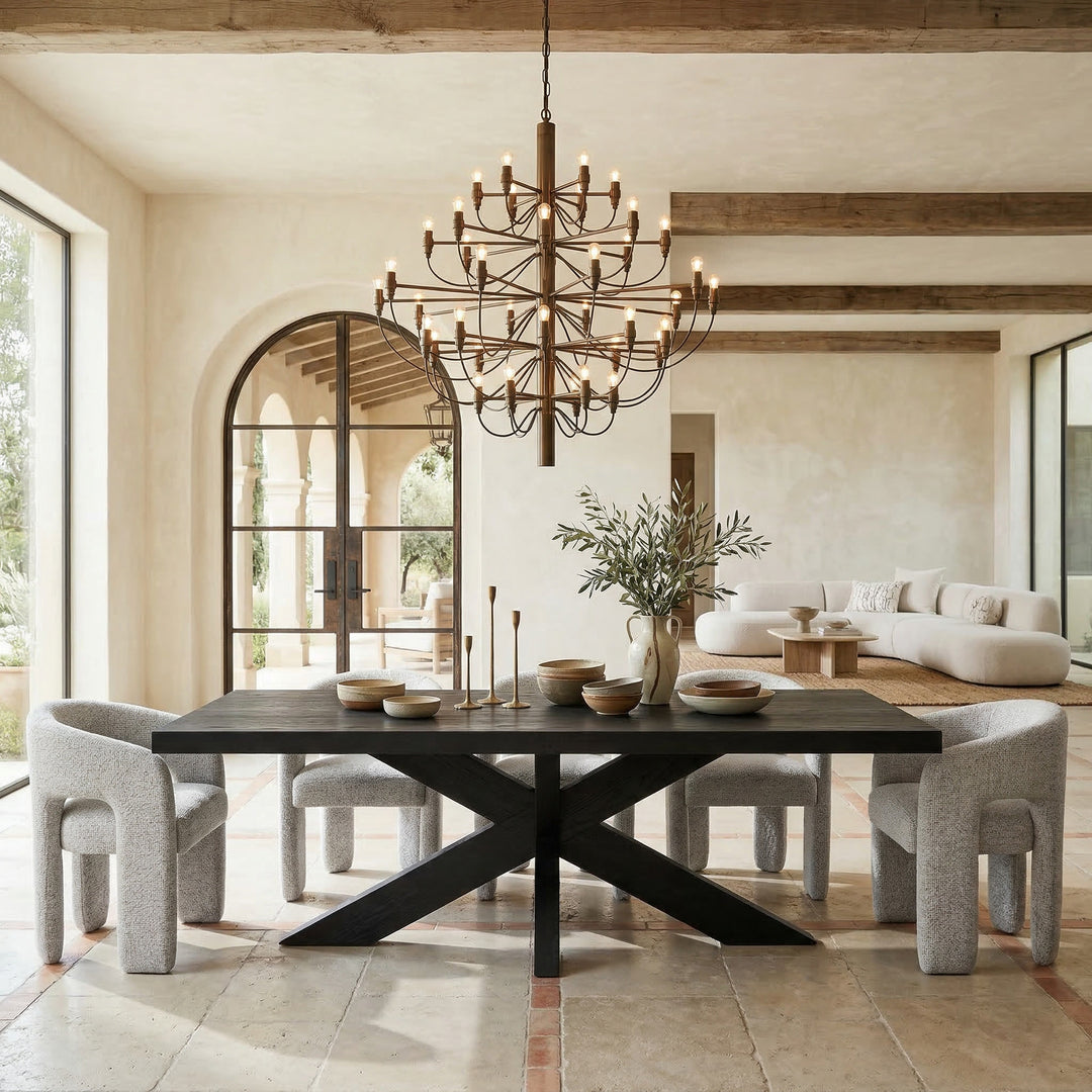 Contemporary Byron dining chair with sleek design, featuring a curved seat and X-shaped metal frame, perfect for modern dining rooms.