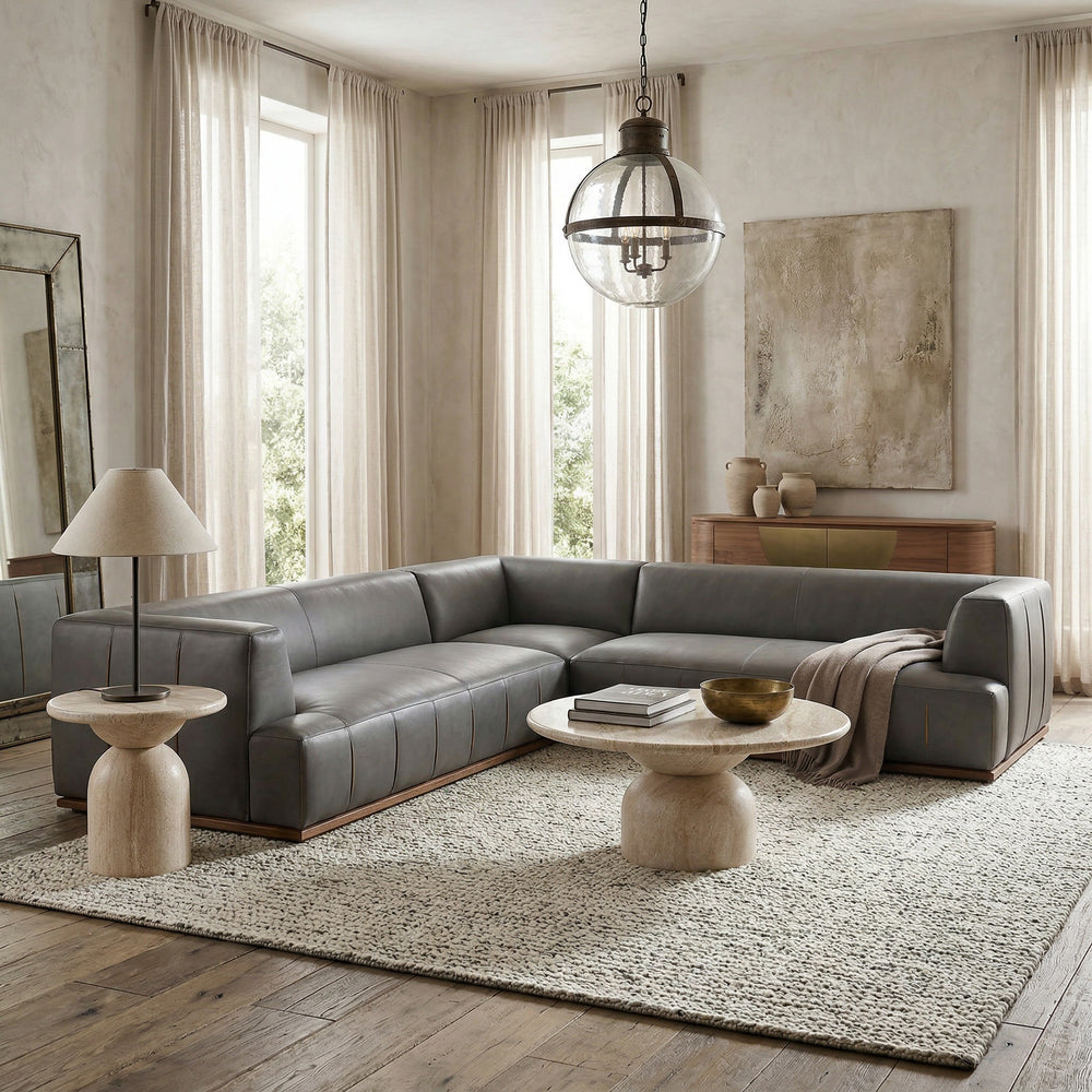 Three-seater Maxwell leather sofa in a modern living room, featuring smooth leather upholstery and contemporary design.