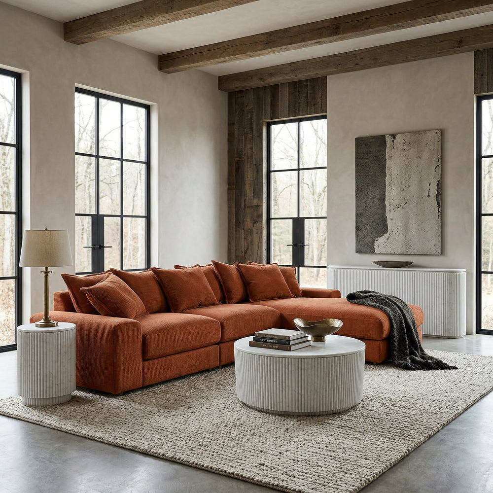 Rust-colored RHF Snuggy Corner Sofa in a cozy living room setting with cushions and modern decor.