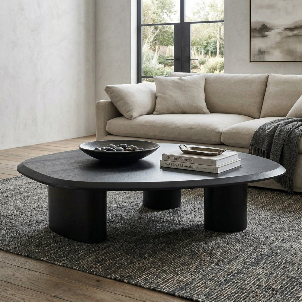 Ghibli Low Coffee Table in a living room setting, featuring a minimalist design with a smooth surface and wooden finish.
