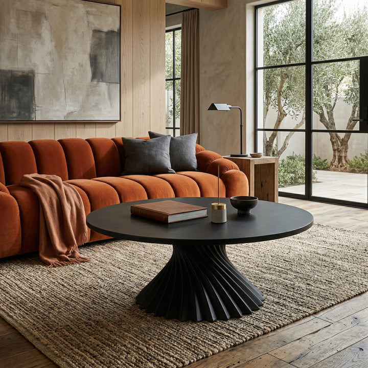 Modern Twirl Coffee Table in a living room setting, showcasing its sleek design and smooth surface for contemporary home decor.