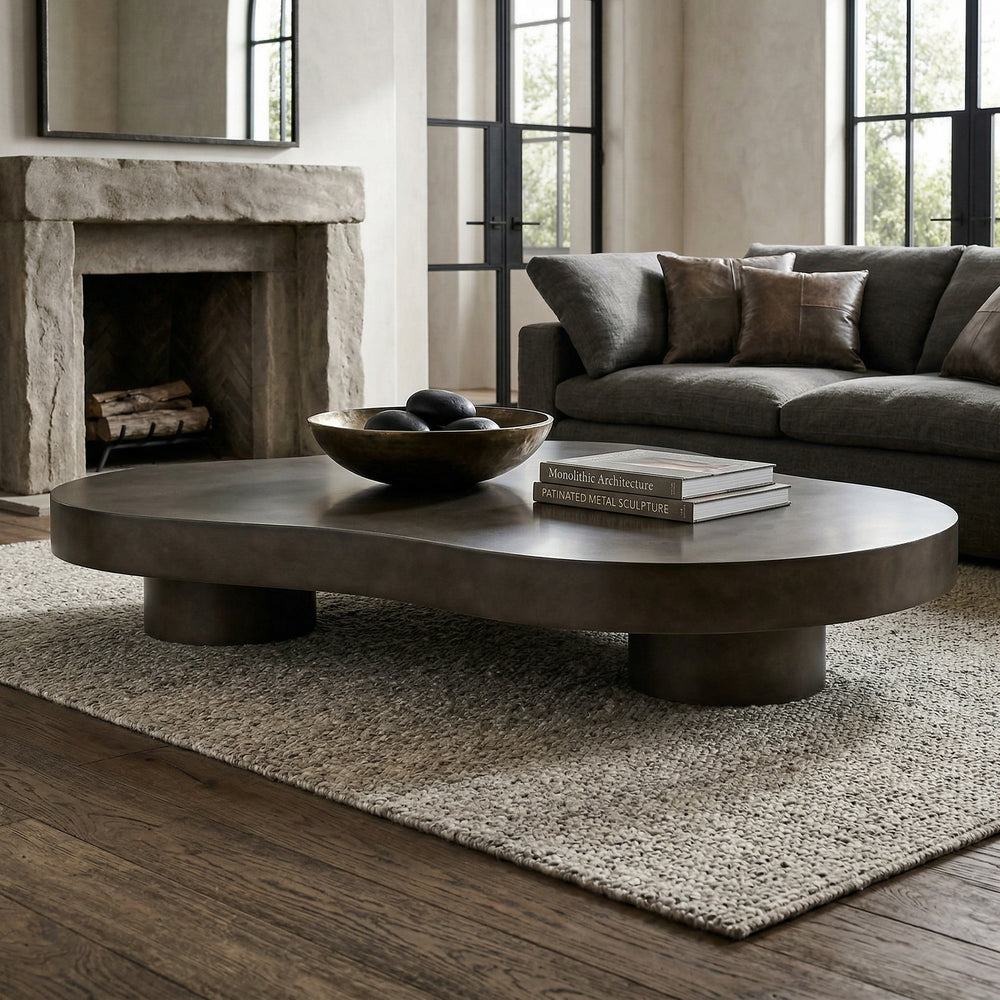 Modern Portia coffee table in a living room setting, featuring a sleek low-profile design and smooth surface.