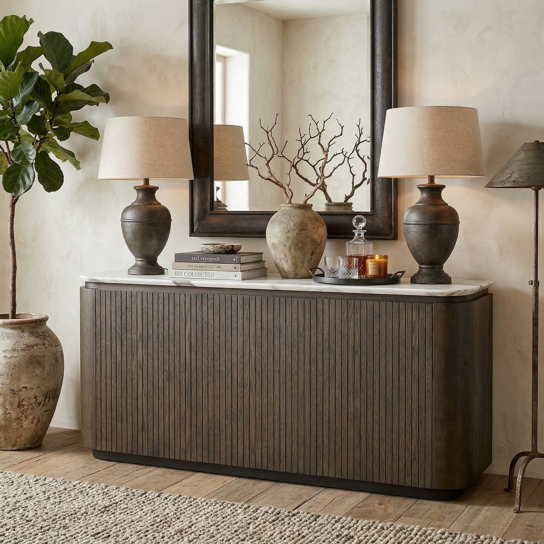 Realistic image of Bocelli 2.4m dining table with marble top placed against a wall in a modern dining room setting.