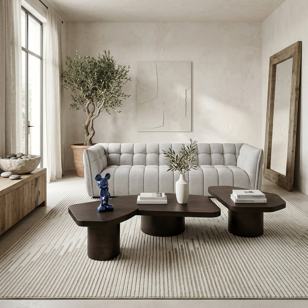 Large Liguria coffee table with dark bronze finish, featuring a sleek, modern design and round shape for contemporary living spaces.