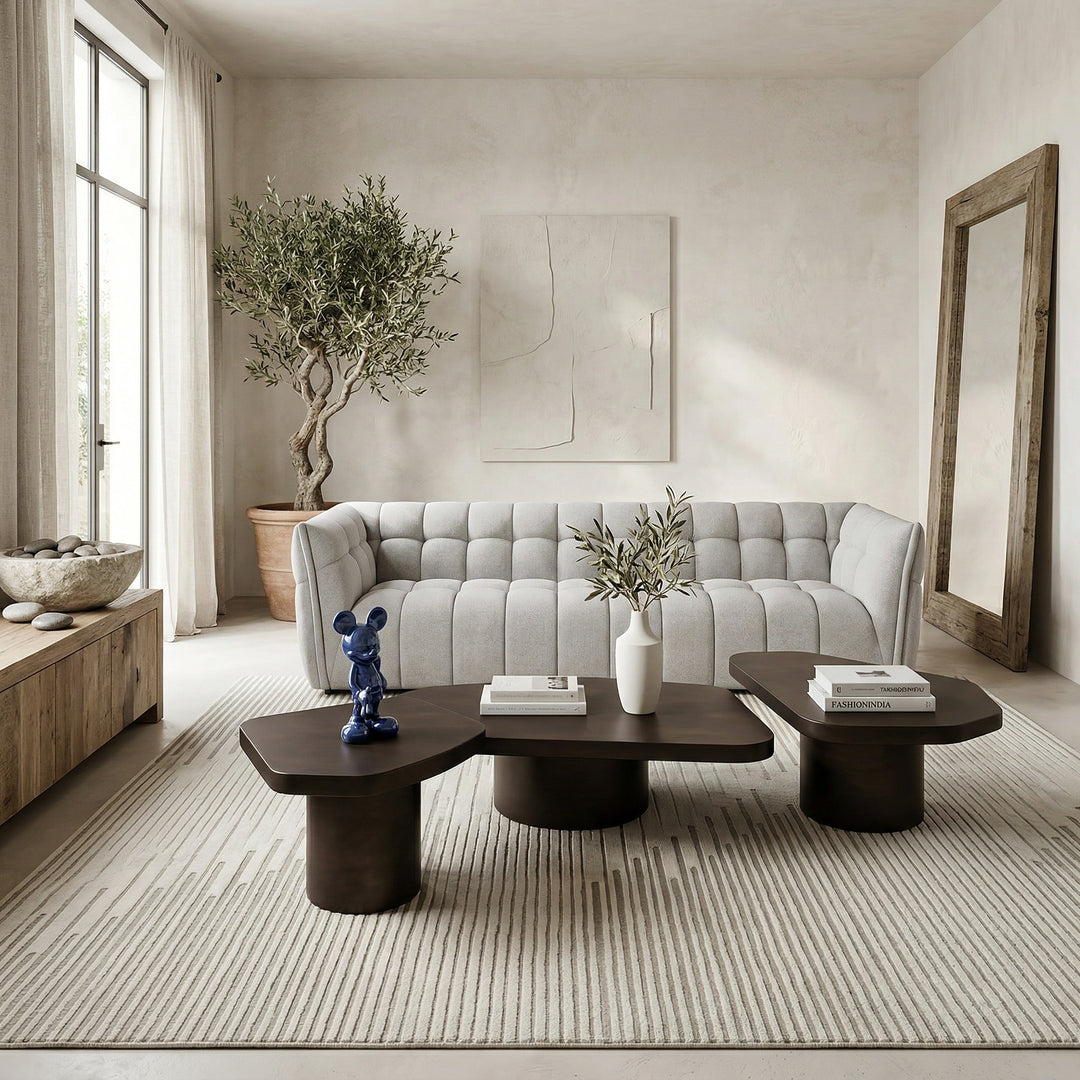 Large Liguria coffee table with dark bronze finish, featuring a sleek, modern design and round shape for contemporary living spaces.