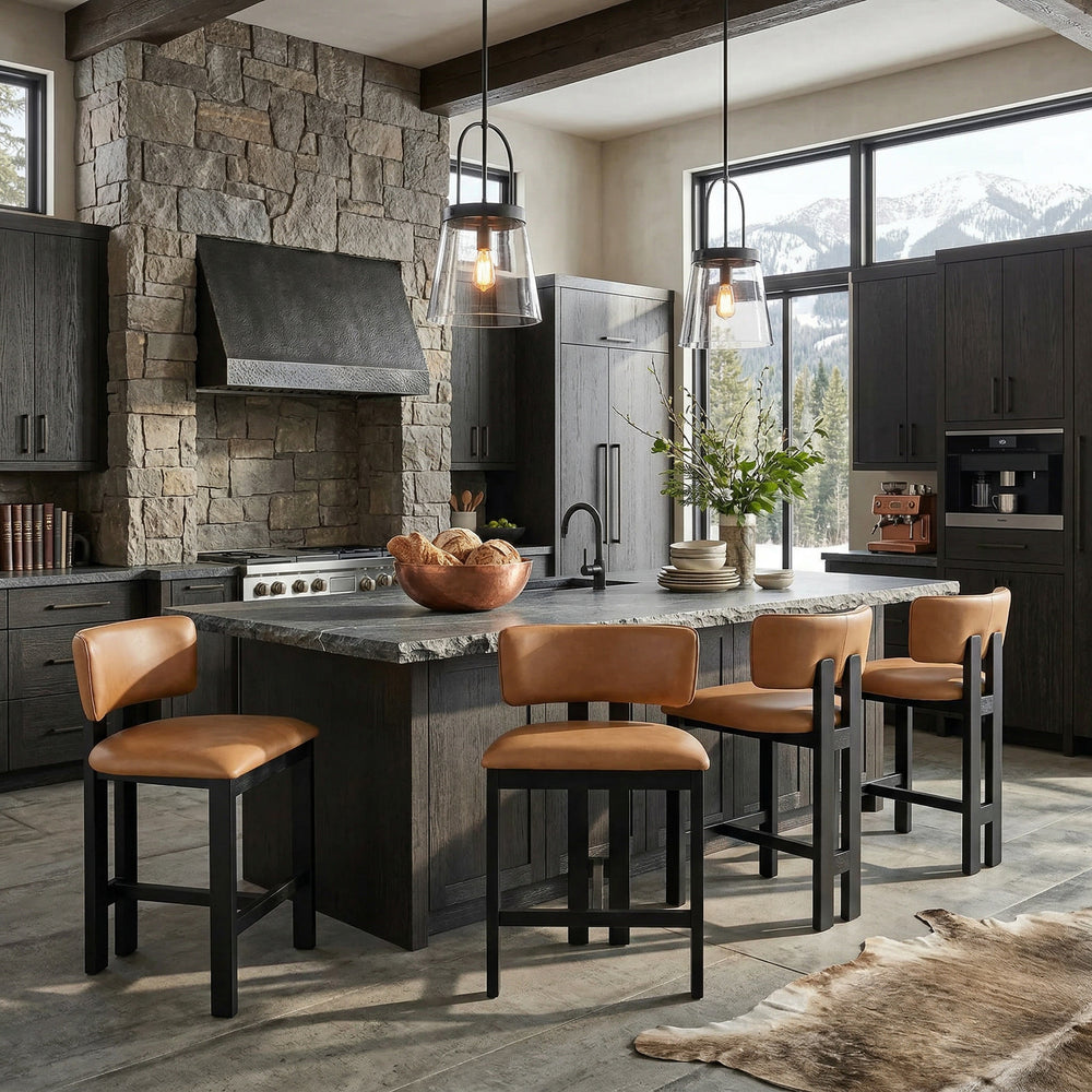 Modern Italian-style bar stool with tan leather upholstery and sleek design, featuring a minimalist metal frame for contemporary kitchens.