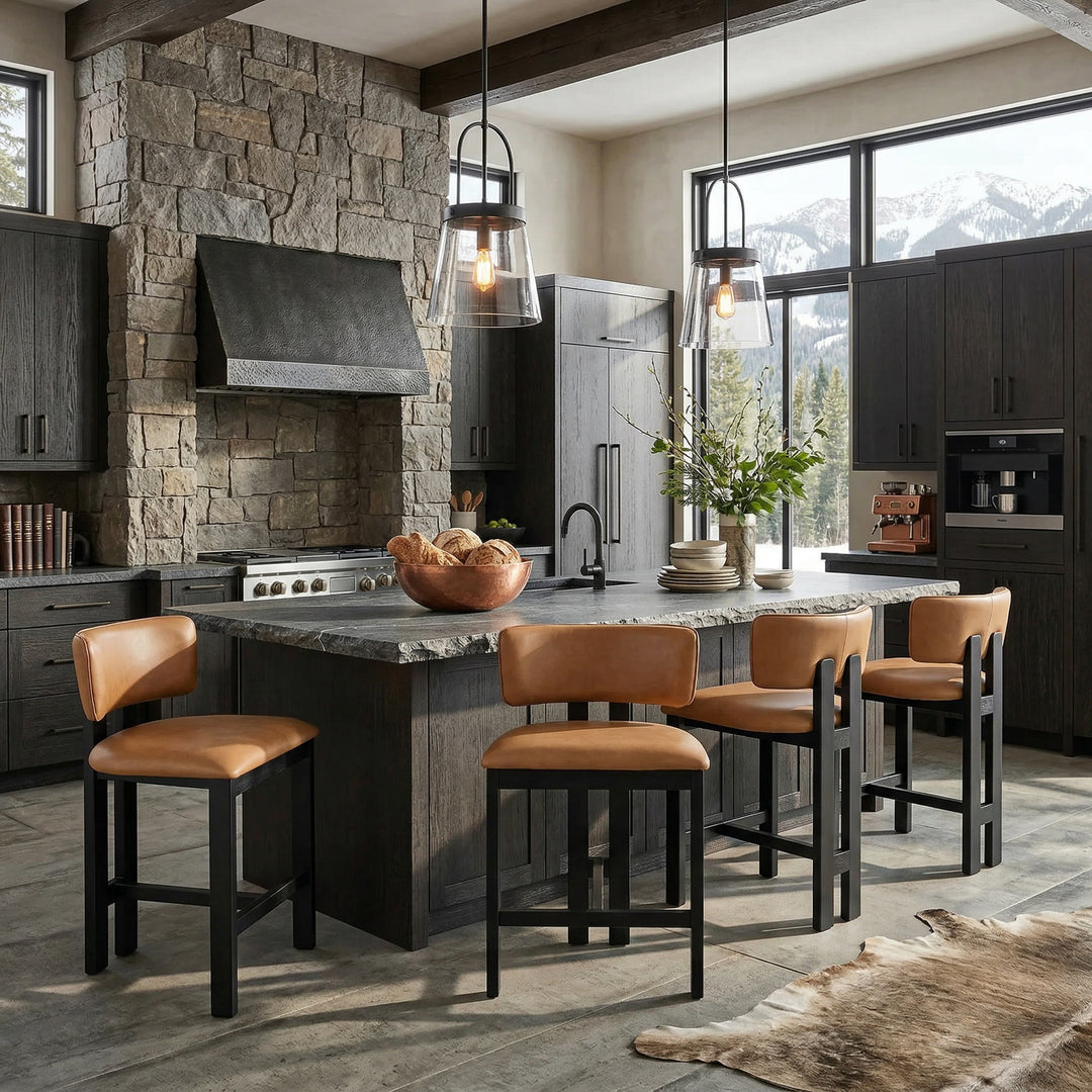 Modern Italian-style tan leather Modenese bar stool with sleek design and wooden legs, perfect for contemporary kitchen or bar area.