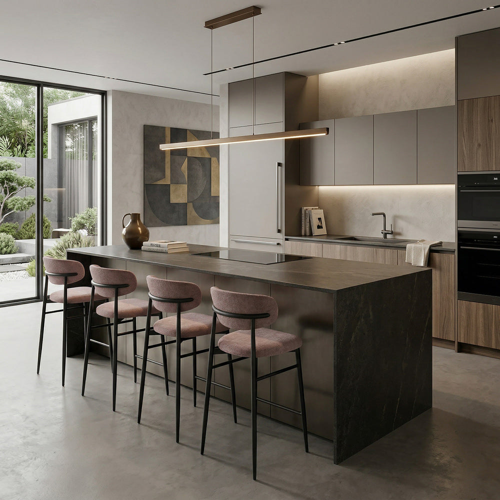 Light pink Valentina bar stool in a modern kitchen setting, featuring sleek design and wooden legs.