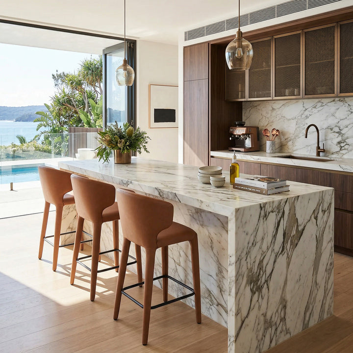 Modern Romano tan leather look bar stool with sleek design, featuring a cushioned seat and sturdy metal base for contemporary kitchens.