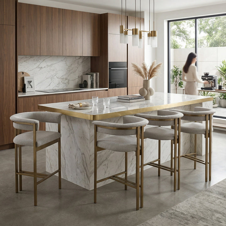 Beige Sheikh Bar Stool in a modern kitchen setting, featuring sleek design and wooden legs, perfect for home bar or kitchen counter seating.