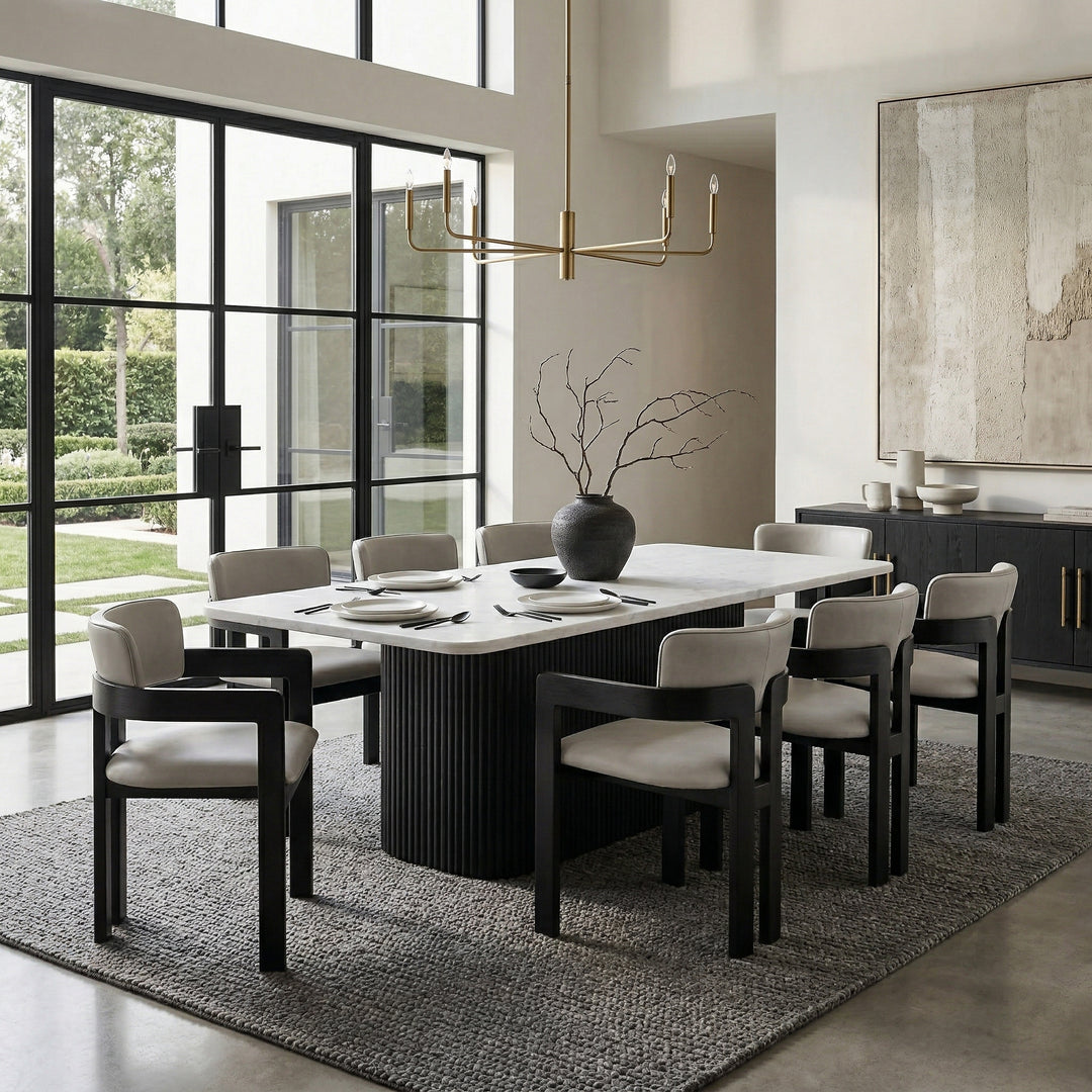 Maison Mushroom Leather Dining Chair showing a sleek, modern design with curved seat and wooden legs in a contemporary dining room setting.