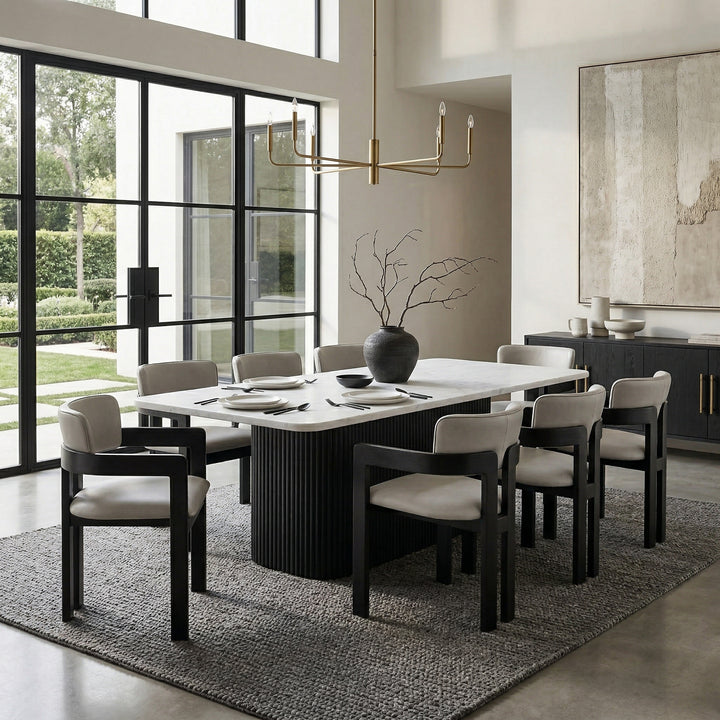 Maison Mushroom Leather Dining Chair showing a sleek, modern design with curved seat and wooden legs in a contemporary dining room setting.