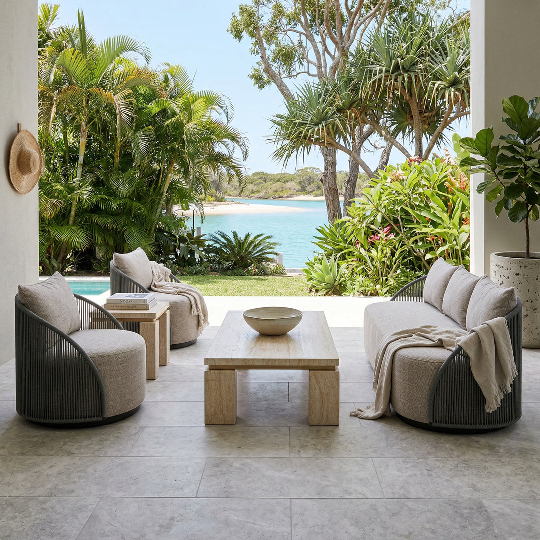 Grey Jardin outdoor arm chair with a modern design, featuring a cushioned seat and armrests for comfortable outdoor seating.