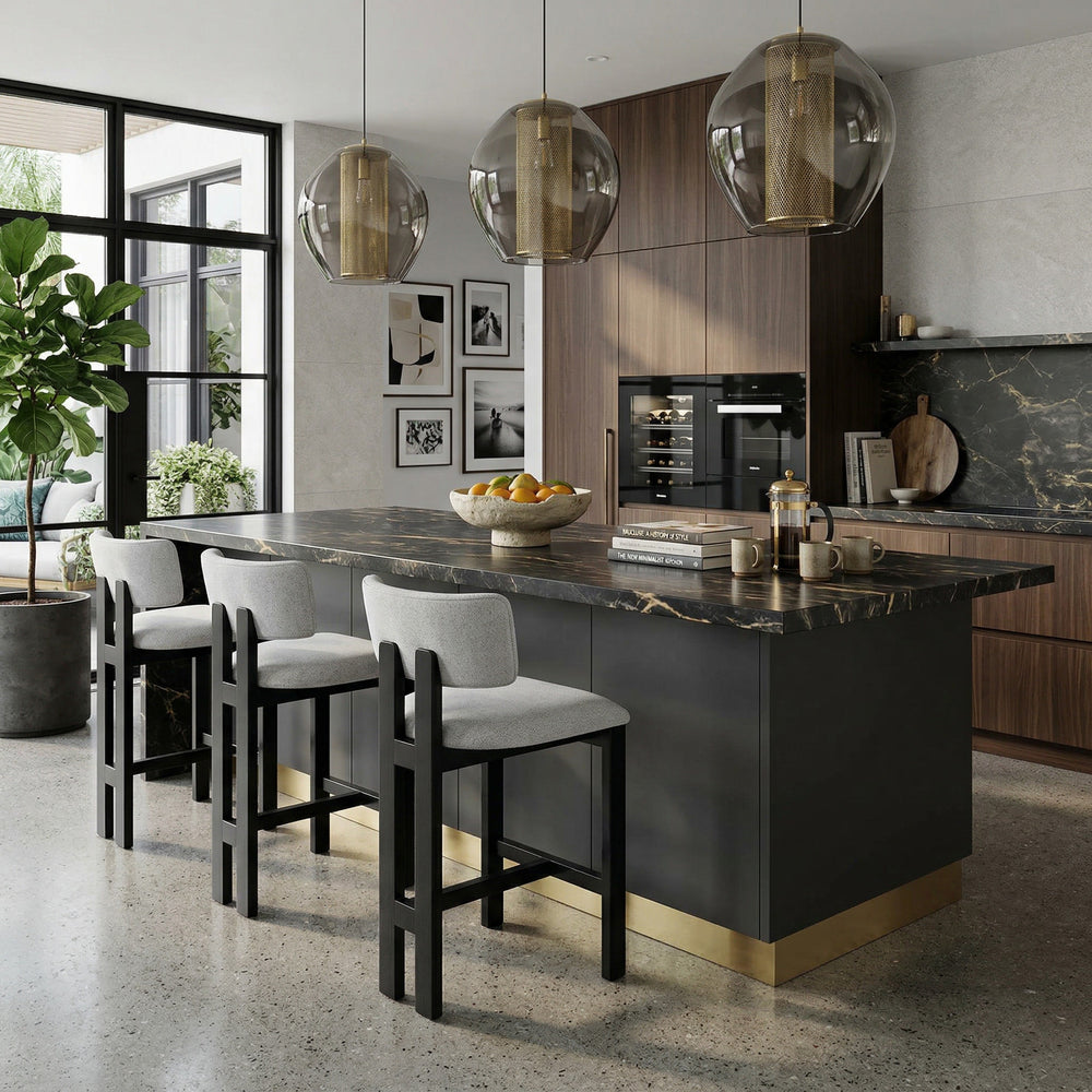 Light grey fabric Modenese bar stool with black wooden legs, modern design, shown in a kitchen setting.