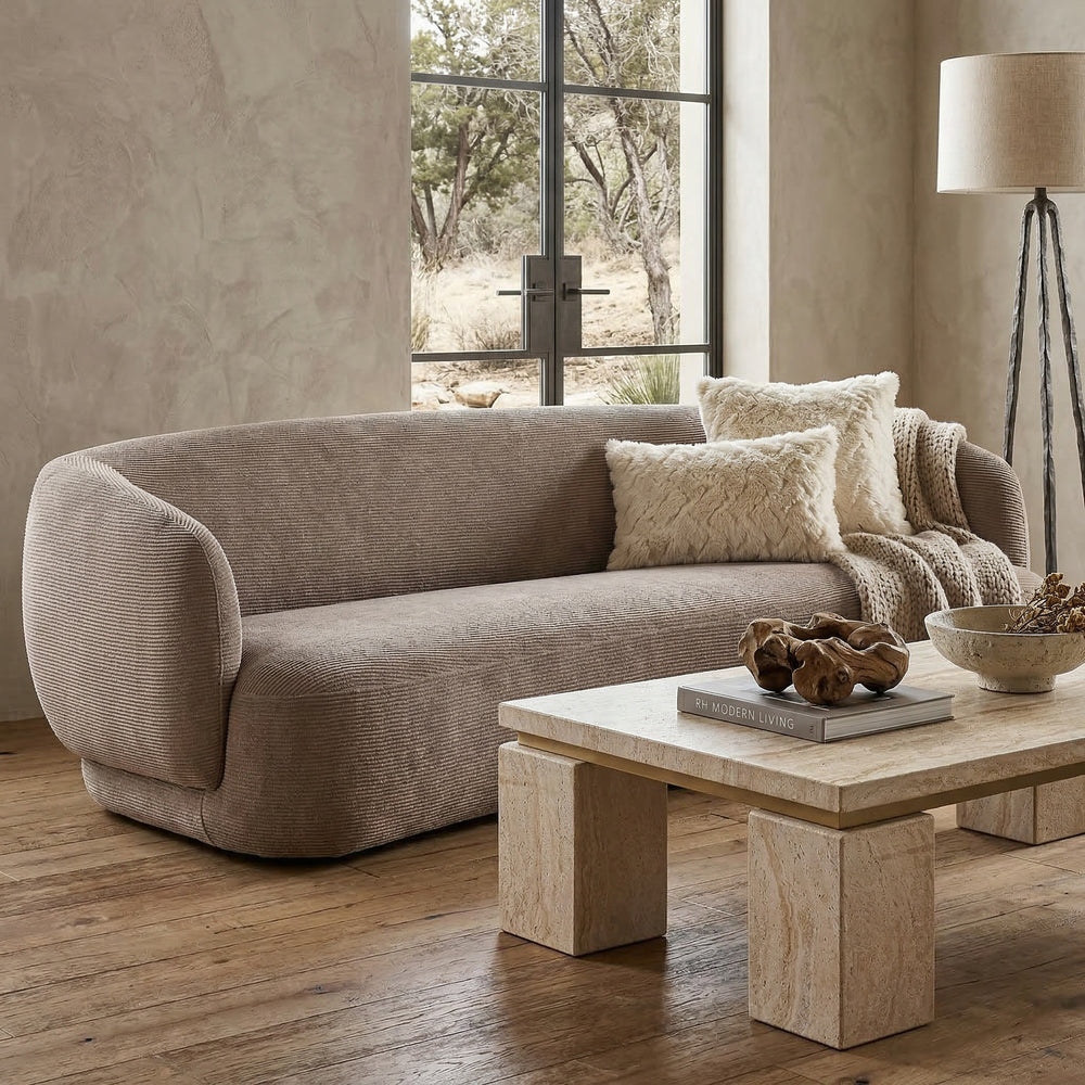 Textured mushroom Puffy 2-seater sofa in a modern living room, showcasing plush fabric and contemporary design.