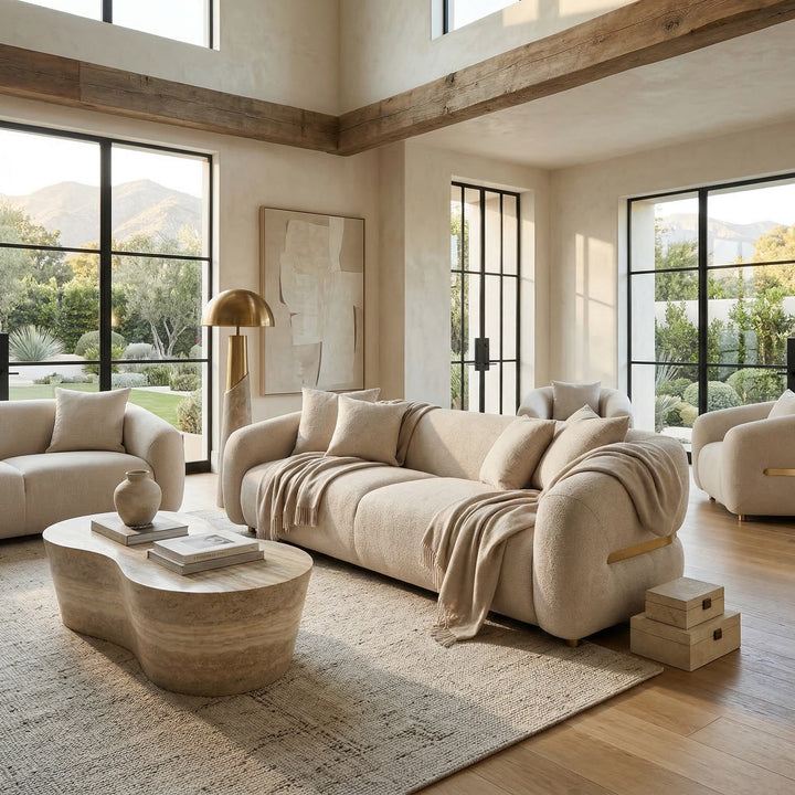 Modern Petra 3-seater sofa with clean lines and neutral upholstery, paired with a matching chair in a contemporary living room setting.