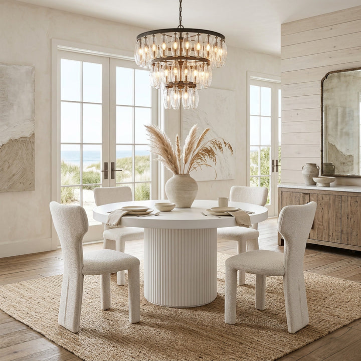 Beige Cecilia dining chair with sleek design, shown near a round white dining table, ideal for modern kitchen or dining room.