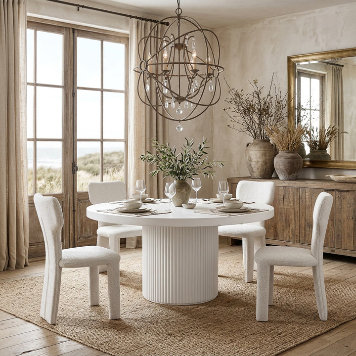 Round white Bondi dining table, 1.2m in diameter, featuring a sleek design perfect for modern dining spaces.