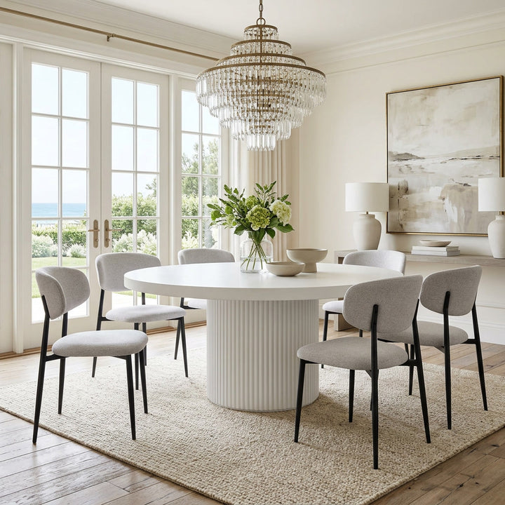 White Bondi Round Dining Table, 1.6m, featuring a sleek modern design with a smooth round tabletop and sturdy base.