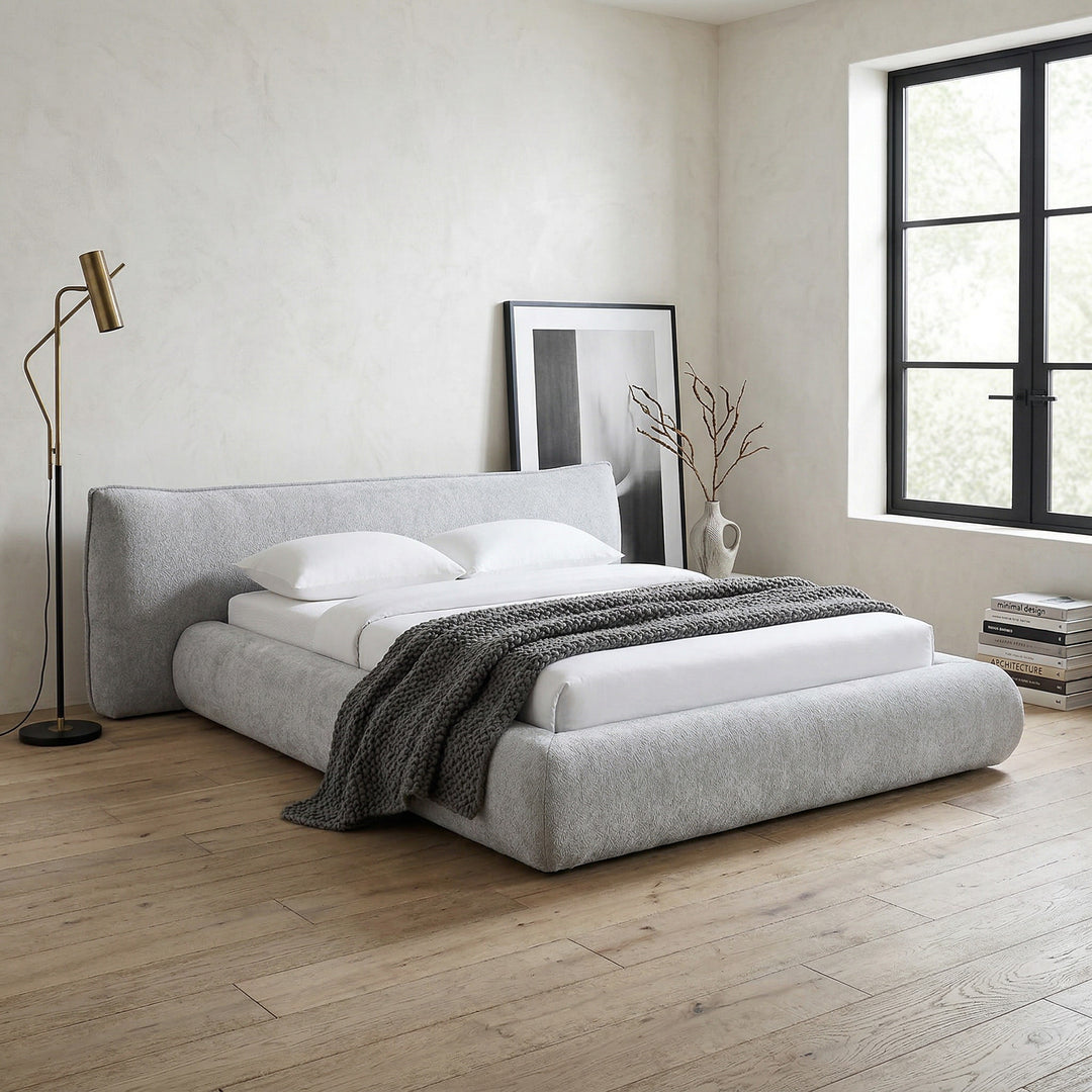 Light grey Barossa Queen Bed in a modern bedroom setting with pillows and bedding, showcasing a stylish and comfortable sleeping space.