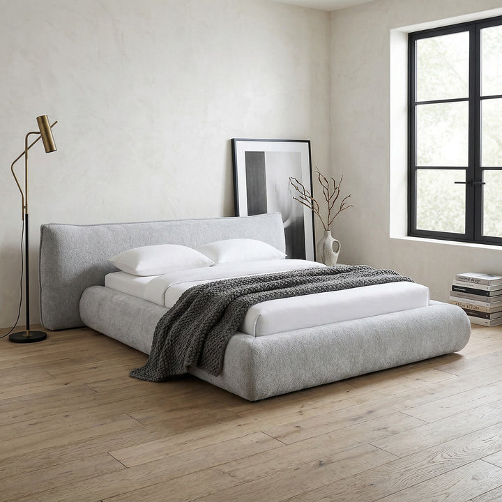 Light grey Barossa Queen Bed in a modern bedroom setting with pillows and bedding, showcasing a stylish and comfortable sleeping space.